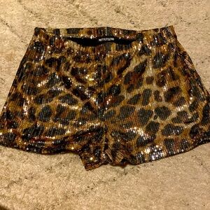 Pretty Little Thing Leopard print mini shorts